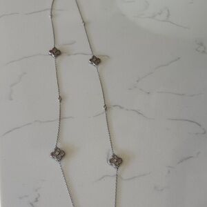 Elegant Silver Necklace with Floral Accents